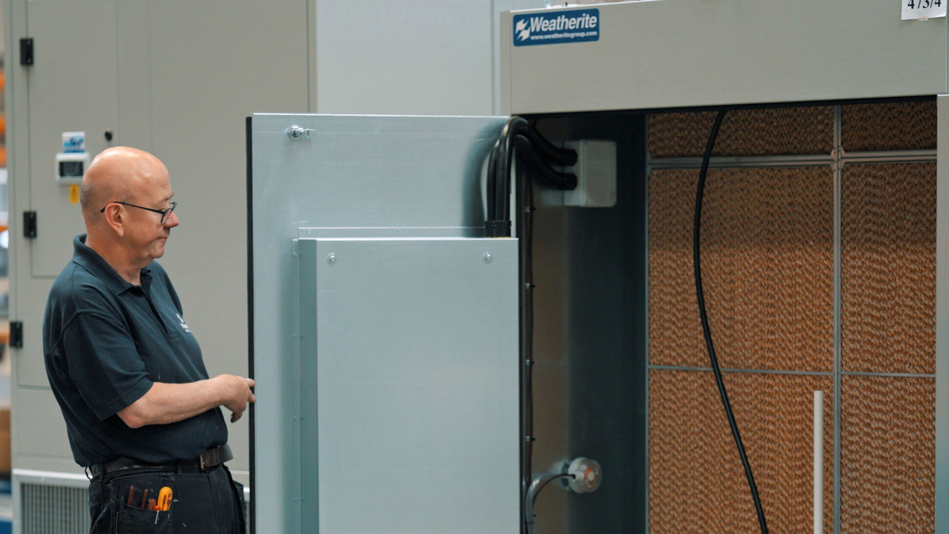 Humidifiers and dehumidifiers for air handling units